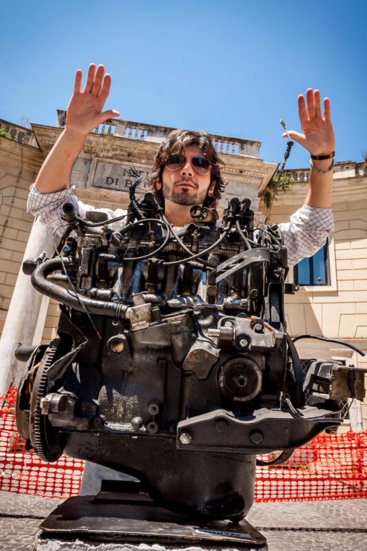 Gio Montez presenting a mechanical heart in front of the Academy of Fine Arts in Rome during Action No. 1 'INITIATION